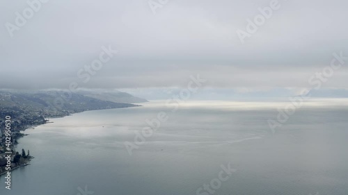 Drone Aerial of the beautiful swiss city center of lausanne located on the lake geneva (lac léman) in Switzerland during winter, Europe. photo