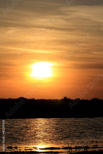sunset over a pond out in the country north of Hutchinson Kansas USA. © Stockphotoman