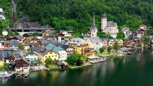 View of famous Hallstatt mountain village in the Austrian Alps at beautiful light in summer, Salzkammergut region, Hallstatt, Austria. Hallstatt village on Hallstatter lake in Austrian Alps.