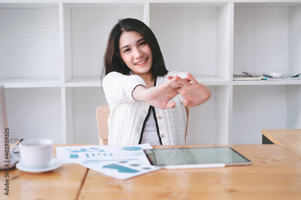 Beautiful young asian freelancer business woman relaxing at work in co-working space or coffee shop. Beautiful young asian freelancer business woman relaxing at work in co-working space or coffee shop.