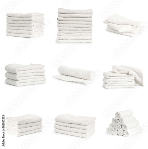 set of white beach towels isolated on white background