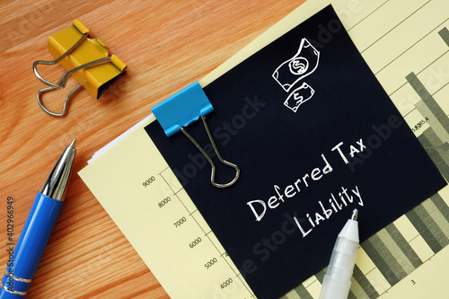 Business concept about Deferred Tax Liability with inscription on the piece of paper. photo