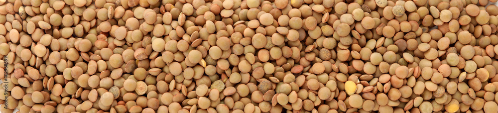 Uncooked legumes on whole background, top view Uncooked legumes on whole background, top view