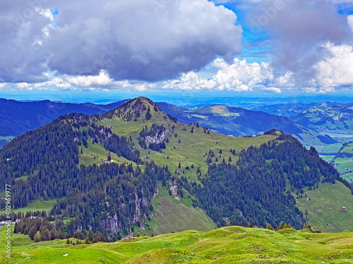 Alpine mountain hills Farenstöckli (Farenstoeckli or Farenstockli) and Roggenstock over the Iberig region and in the Schwyz Alps mountain massif, Oberiberg - Canton of Schwyz, Switzerland (Schweiz) photo