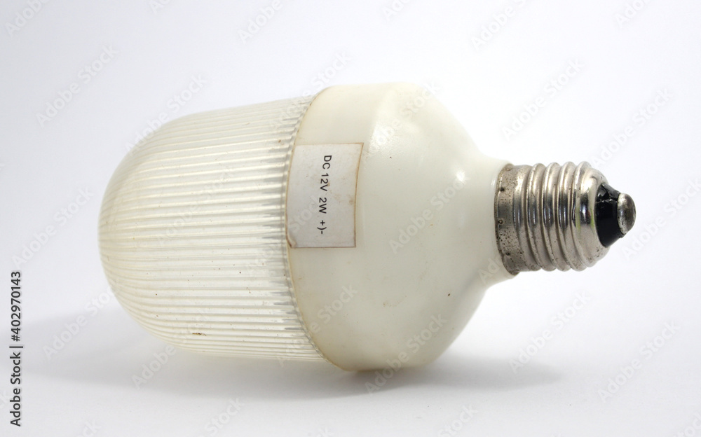 Old white solar powered LED bulbs on isolate background Old white solar powered LED bulbs on isolate background