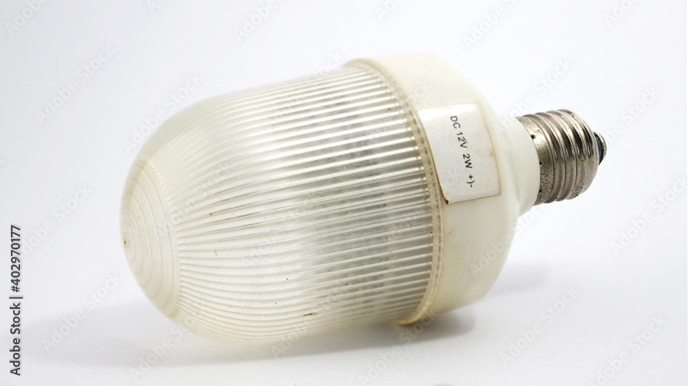 Old white solar powered LED bulbs on isolate background Old white solar powered LED bulbs on isolate background