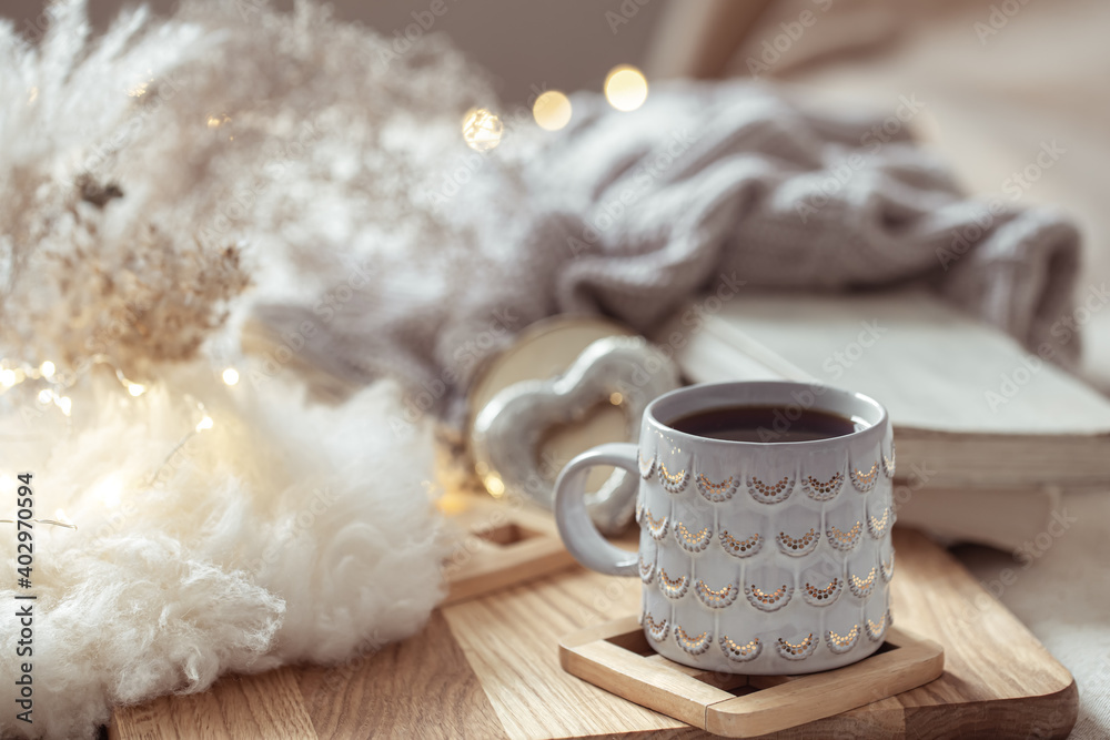 Home composition with beautiful cup on blurred cozy background. Home composition with beautiful cup on blurred cozy background.