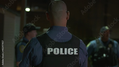 Police Officers Listening at Meeting Night 4K