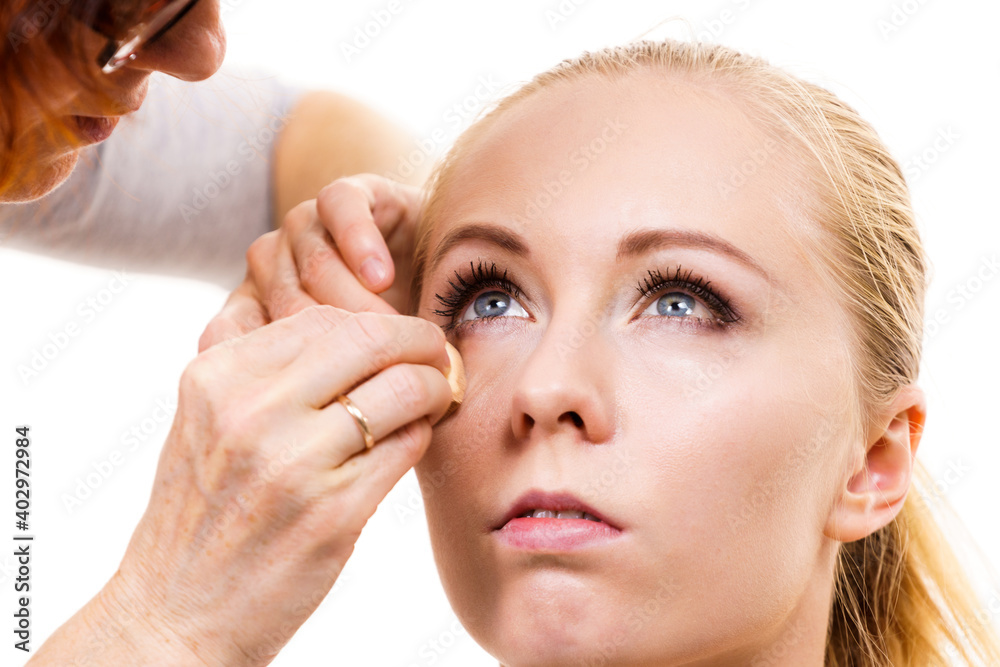 Makeup artist apply make up