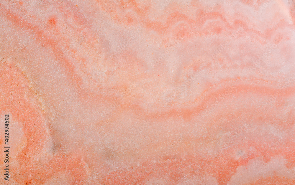 Fototapeta premium low-contrast orange and pink color agate closeup