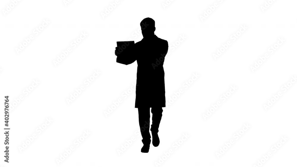Arab doctor looking at cardiogram walking, Alpha Channel Arab doctor looking at cardiogram walking, Alpha Channel