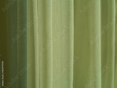 Close-up texture of the curtains in white tones.