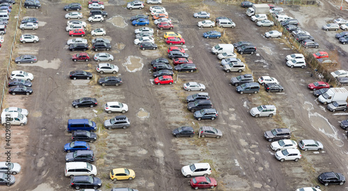 Outdoor unpaved parking lot, panoramic top view