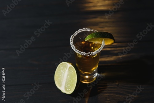 Tequila shot with lime . Selective focus