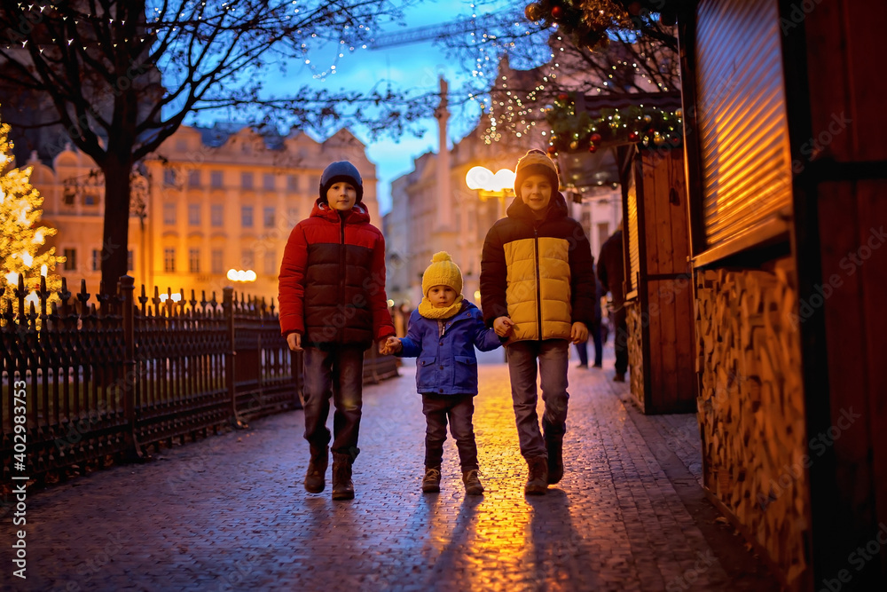 Child in Prague on Christmas, christmas lights and decoration