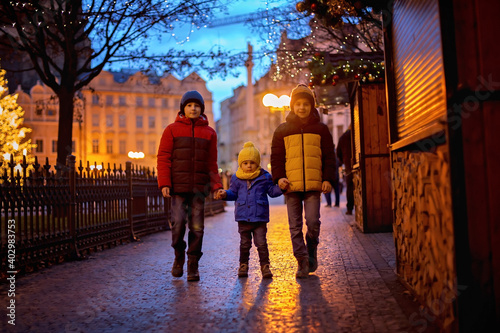 Child in Prague on Christmas, christmas lights and decoration