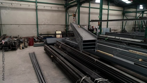 moving steel beam in a factory 4k