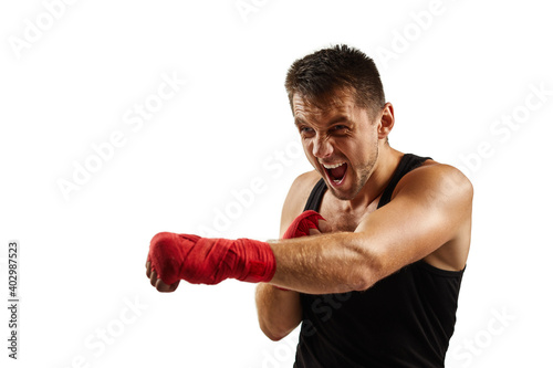 sportsman in red sports bandages on his hands fighting isolated on white background
