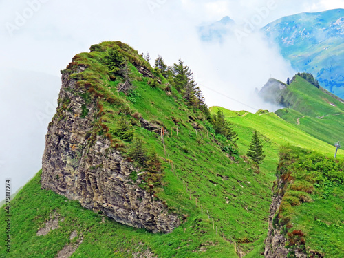 Alpine mountain hill Chli Stärnen (Chli Staernen or Chli Starnen) over the Iberig region and in the Schwyz Alps mountain massif, Oberiberg - Canton of Schwyz, Switzerland (Kanton Schwyz, Schweiz) photo