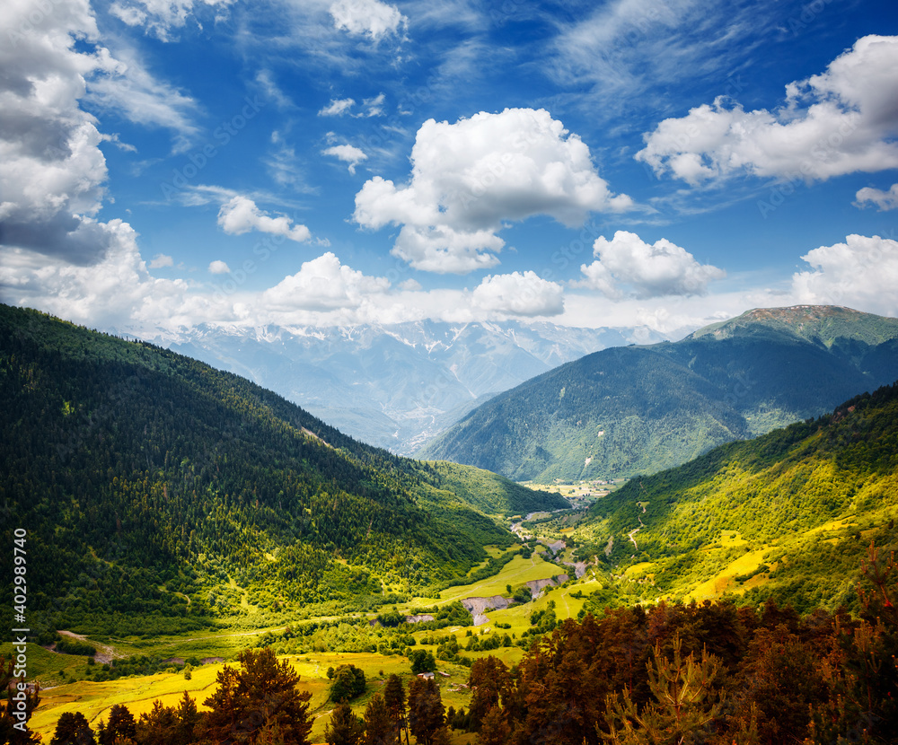 Stunning summer view of the alpine meadows at the foot of Mt. Ushba. Location place Upper Svaneti, Georgia, Europe.