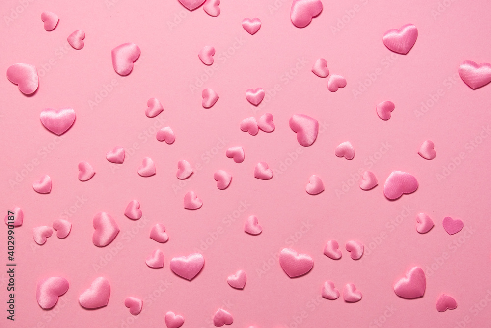 Valentine's day background. pink hearts on a pink background.