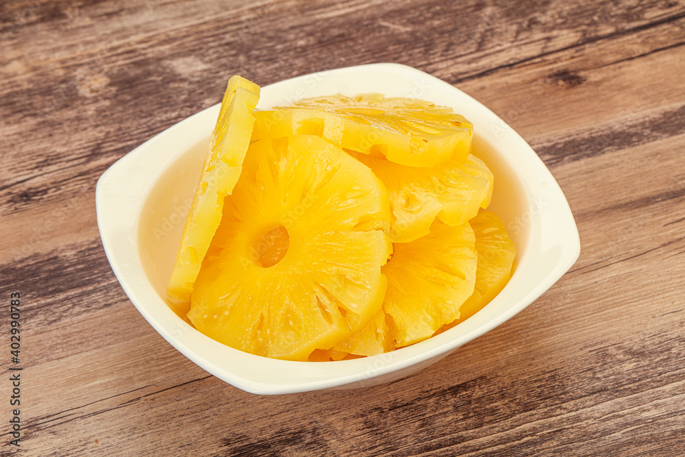 Marinated pineapple rings in the bowl Marinated pineapple rings in the bowl