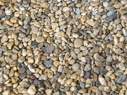 brown pebbles stone path floor in garden a nature and abstract background of river pebble surface for outdoor decoration