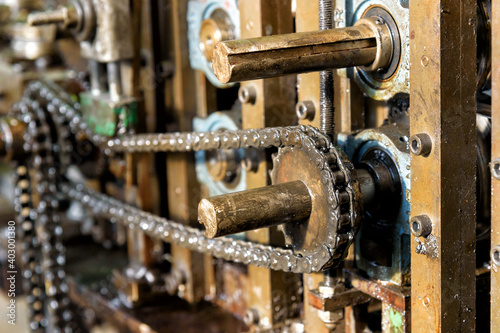 Close up on the master drive chain on machinery