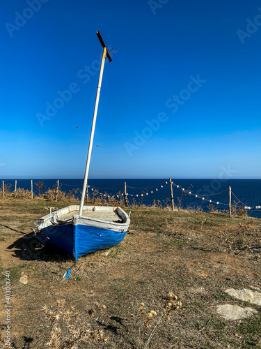 blue white Boat, sky and sea