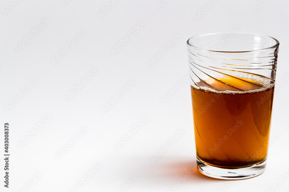 moroccan tea glass on white background with copy space moroccan tea glass on white background with copy space