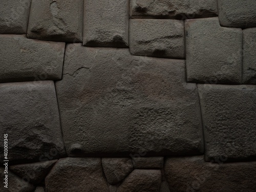 Twelve angled stone archeology heritage part of Archbishops palace wall Cusco Peru South America photo