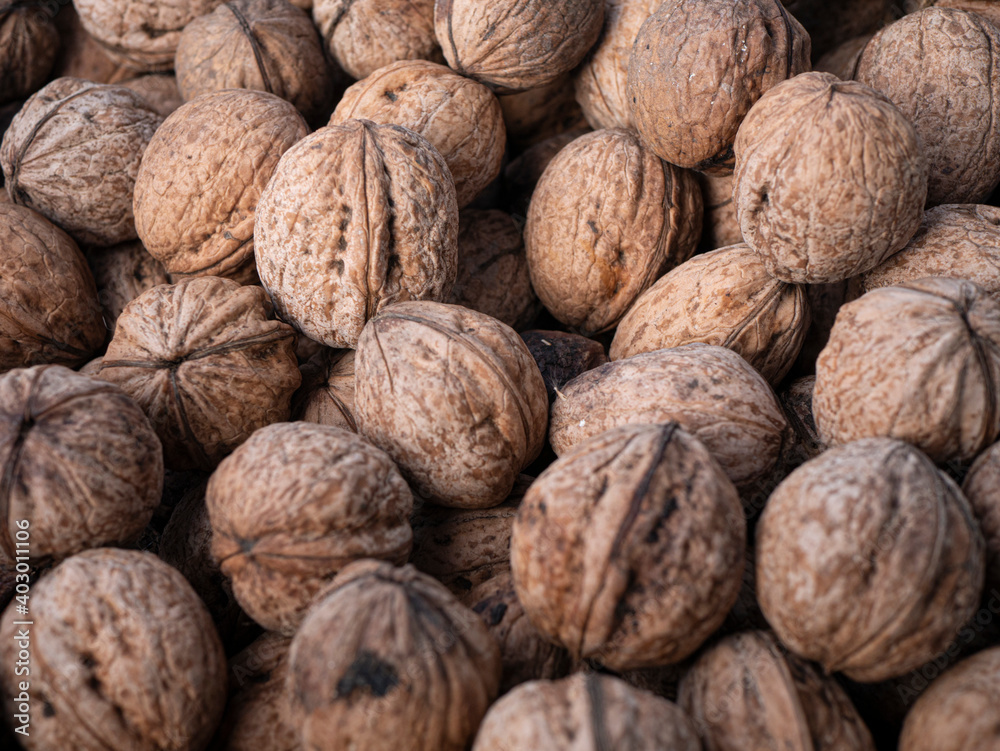 Background with fresh wild walnuts Background with fresh wild walnuts