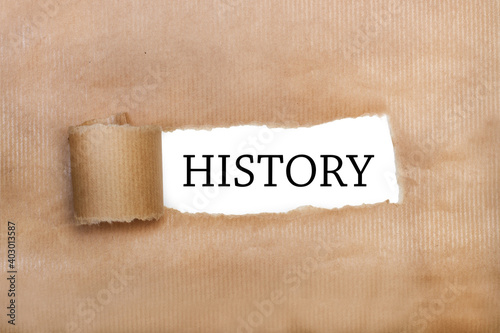 Descubriendo palabra History sobre un fondo blanco. Vista superior. Copy space photo