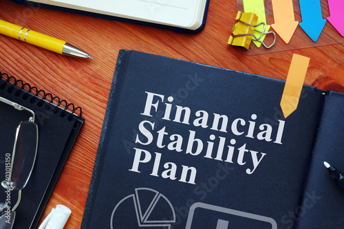 Financial Stability Plan FSP with charts and pen. photo