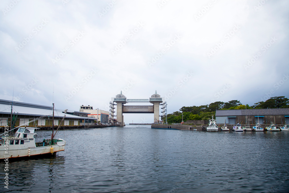 The Tsunami Gate at the entrance to the fishing port of Numazu City in Shizuoka Prefecture, Japan.
