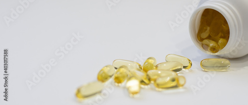 Fish oil pills capsules tablets omega 3 healthy diet concept