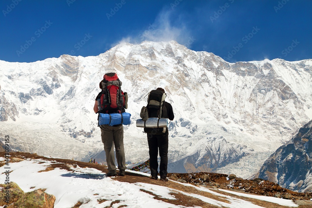 Mount Annapurna with two tourists