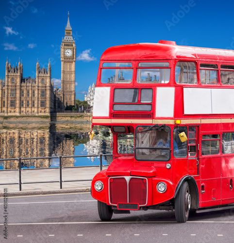 Big Ben with old red double decker bus in London  England  UK