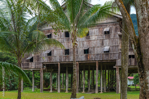 The traditional tall and longhouse of the Melanau tribe is an elevated building, mostly located in the Sarawak state of Malaysia on Borneo photo