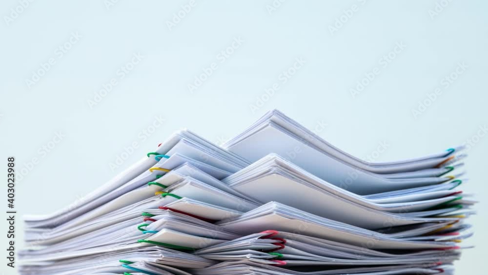 Stack of document paper with colorful paperclip place on white background, business concept footage paperless used – 4k Stop motion Stack of document paper with colorful paperclip place on white background, business concept footage paperless used – 4k Stop motion