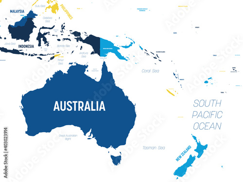 Australia and Oceania map - brown orange hue colored on dark background. High detailed political map of australian and pacific region with country, ocean and sea names labeling