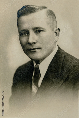 Germany - CIRCA 1930s: Man portrait close up in studio art deco era Vintage photo