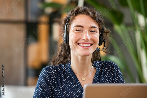 Successful customer service agent working at office photo