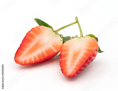 1 strawberry, cut inside on a white background