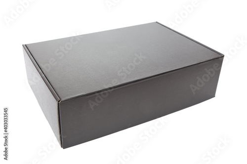 Unopend black cardboard box on white background