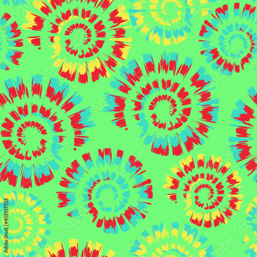 Seamless vector pattern with colourful tie dye spiral on green blue background. Artistic shell fossil wallpaper design. Decorative summer festival fashion textile.