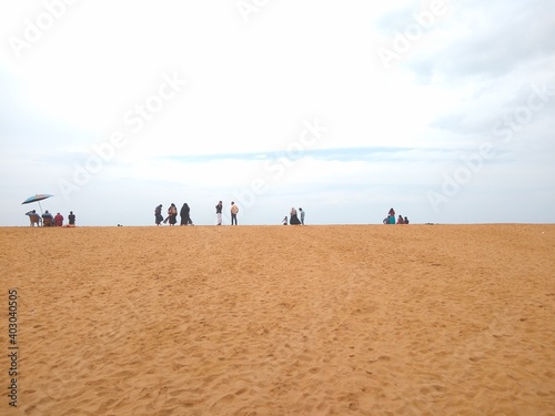 people walking on the beach, Veli tourist village Thiruvananthapuram Kerala