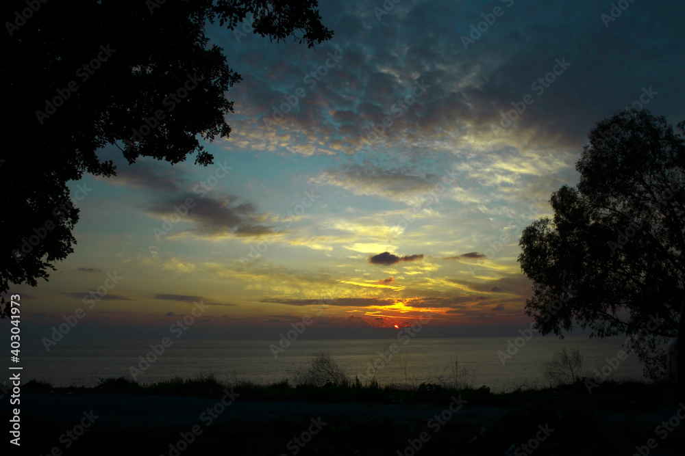 Sunset, also known as sundown, is the daily disappearance of the Sun below the horizon due to Earth's rotation. As viewed from the photograph, sun is leaving the area slowly. Sunset, also known as sundown, is the daily disappearance of the Sun below the horizon due to Earth's rotation. As viewed from the photograph, sun is leaving the area slowly.