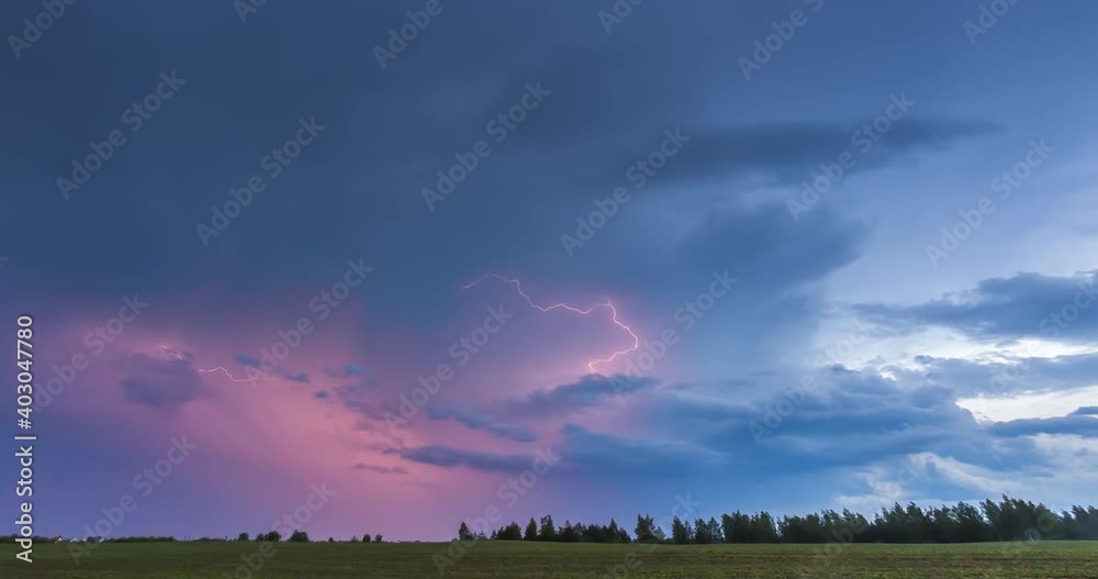 Dramatic lightning storm clouds in the evening sky Dramatic lightning storm clouds in the evening sky
