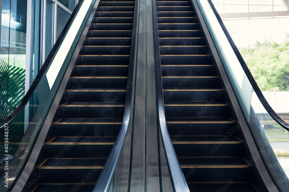 Electric escalators with railing moving up and down Electric escalators with railing moving up and down